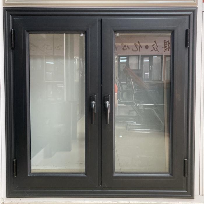 Black aluminum swing window with frame trim